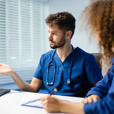 Doctor discussing brain scan results with a patient